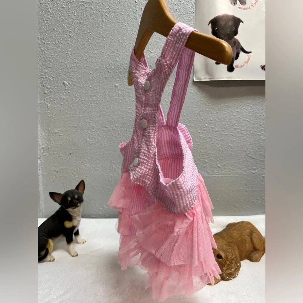Pink and white striped ruffled dog dress with suspenders